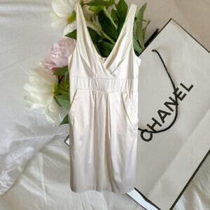 Intrigue 12 white sleeveless lined front pockets court house wedding dress.